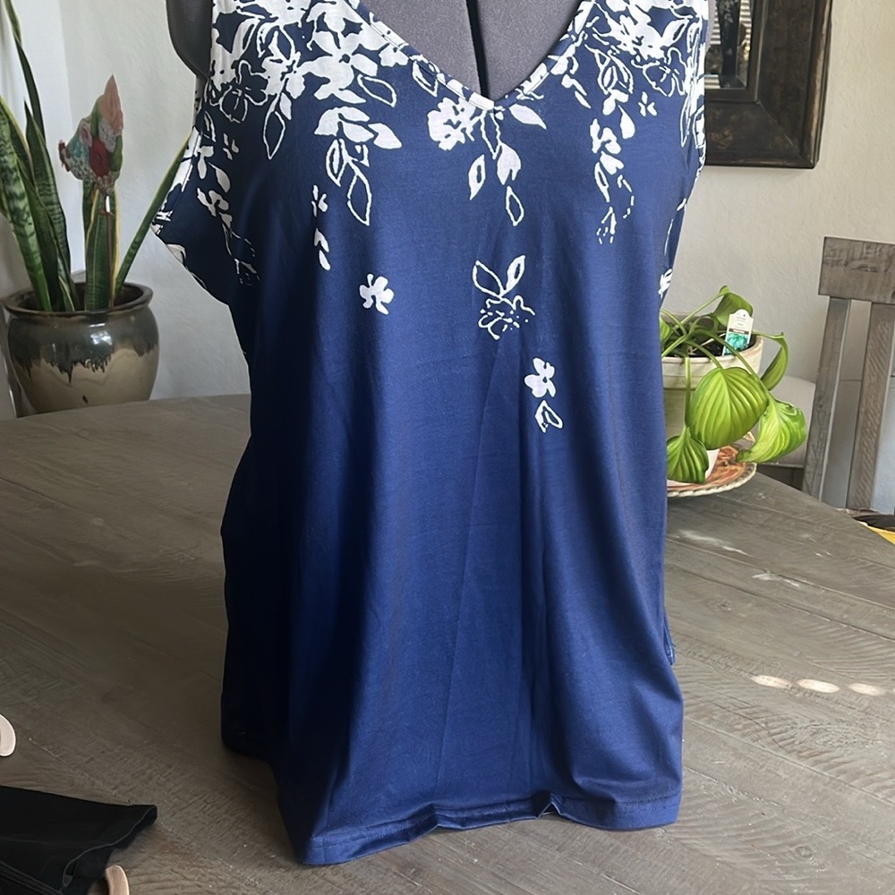 Navy blue jersey poly sleeveless top.